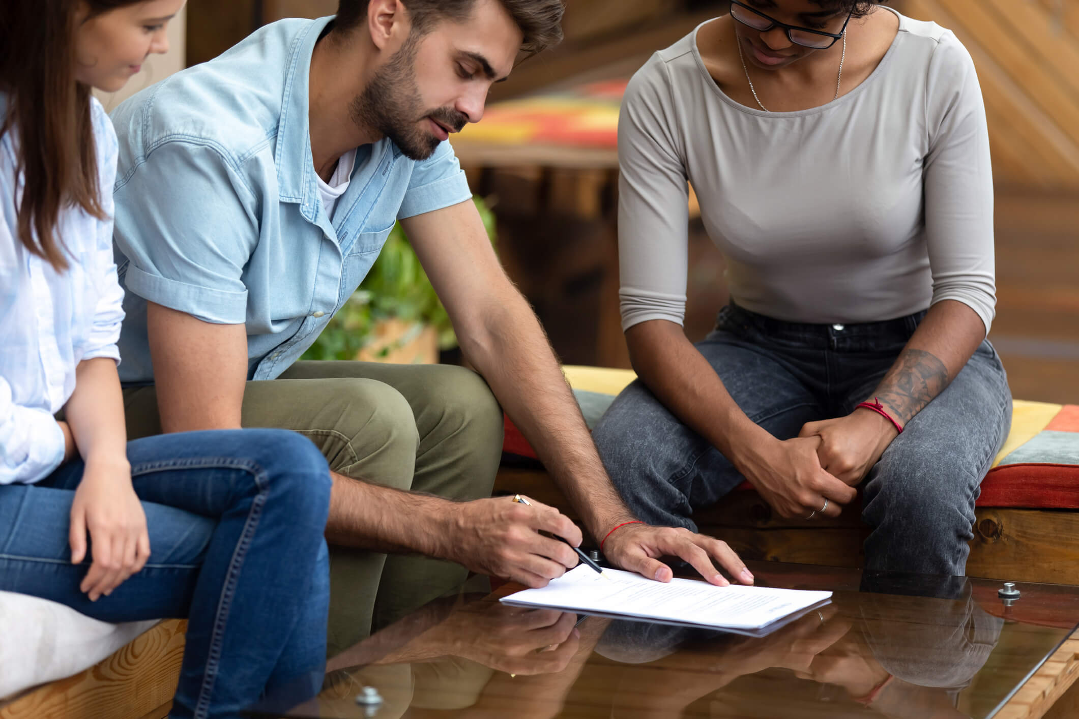 A couple reviewing a lease agreement with west palm beach property manager