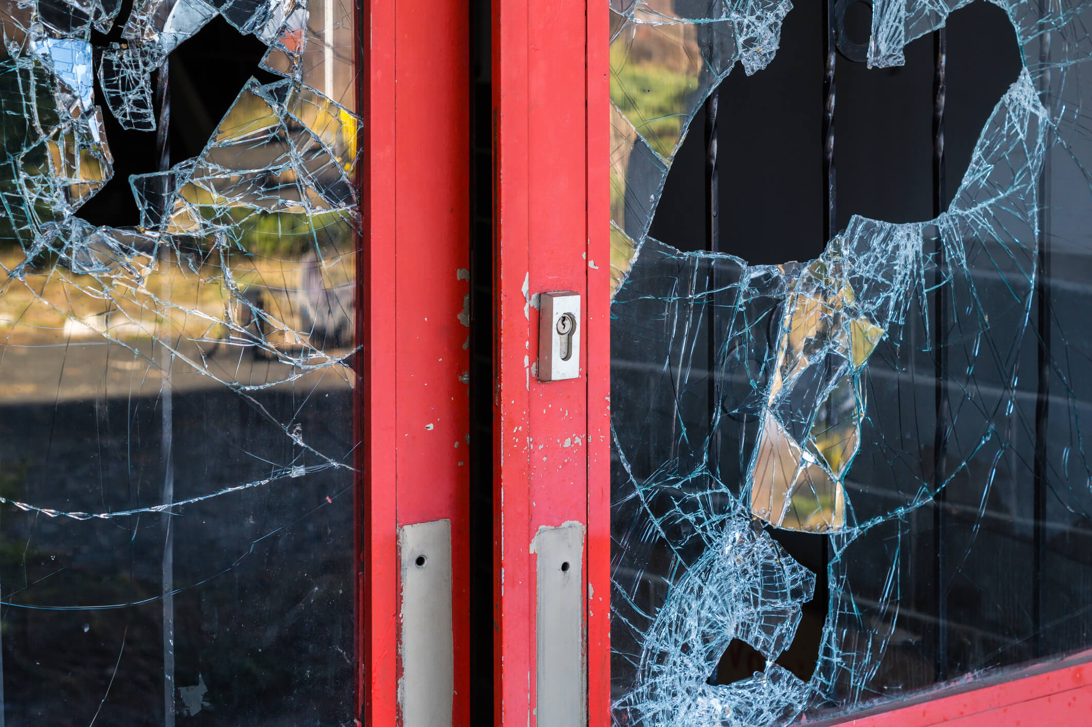 Broken window of property in Riviera Beach, FL